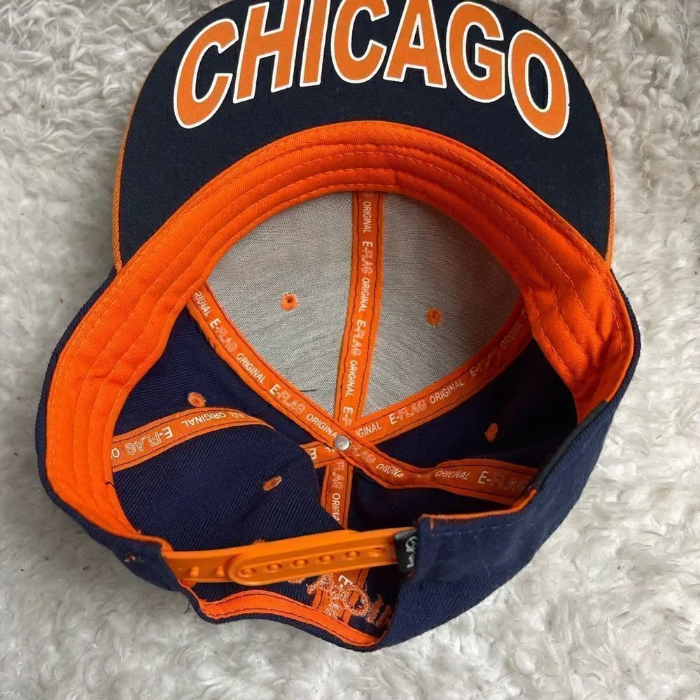 E-Flag Chicago snap back Navy Blue and orange cap adjustable back strap.